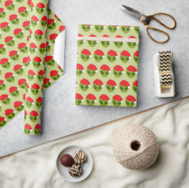 Niedliche grüne Alien in Weihnachtsmannmütze Muste Geschenkpapier