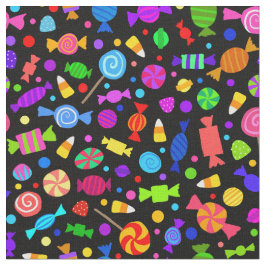 Niedliche Halloween-Süßigkeit auf schwarzem Stoff