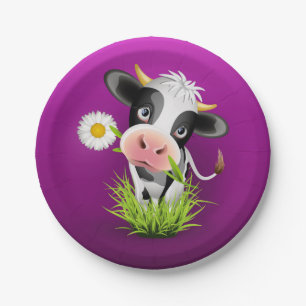 Niedliche Holsteinkuh im Gras über lila Pappteller