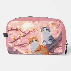 Niedliche Katzen auf einem Kirschblütenbaum Waschbeutel