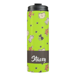 Niedliche Katzen auf grün Thermosbecher