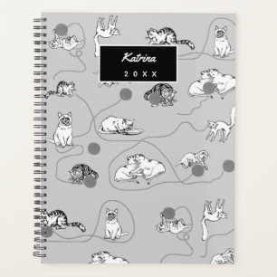 Niedliche Katzen spielen und ein schwaches Muster Planer