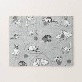 Niedliche Katzen spielen und ein schwaches Muster  Puzzle