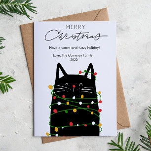 Niedliche Katzenbeleuchtung Überweihnachtliche Woh Feiertagskarte
