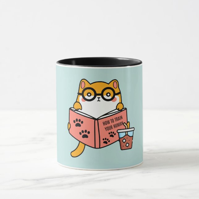 Niedliche Kawaii-Katze liest ein Buch Tasse (Zentrum)