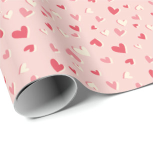 Niedliche kleine Herzen in Rosa Geschenkpapier