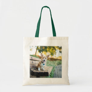 Niedliche Kleintiere Corgi Puppy auf einer Parkb Tragetasche