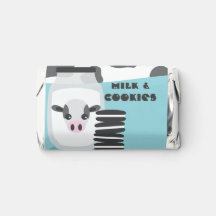 Niedliche Kuh- und Milchprodukte und Cookies Blaue