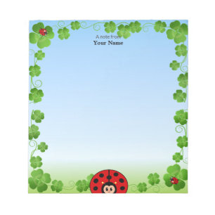 Niedliche Ladybug auf Light Blue Notizblock