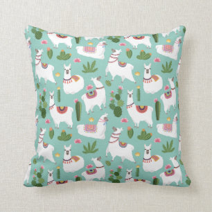 Niedliche Lamas auf aquamarinem Muster Kissen