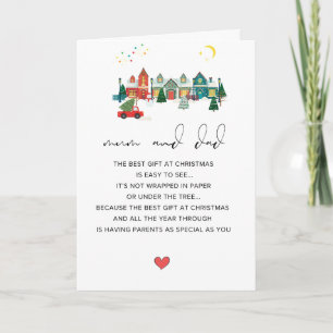 Niedliche Mama und Vater Frohe Weihnachten geklapp