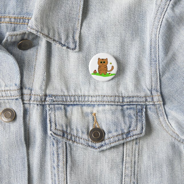 Niedliche Orangenkatze auf grüner Wiese Button (Beispiel)