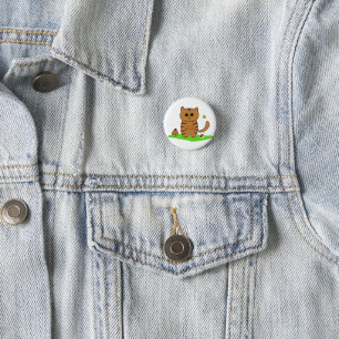 Niedliche Orangenkatze auf grüner Wiese Button