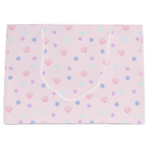 Niedliche Pastellrosa Muscheln Seesterne und Perle