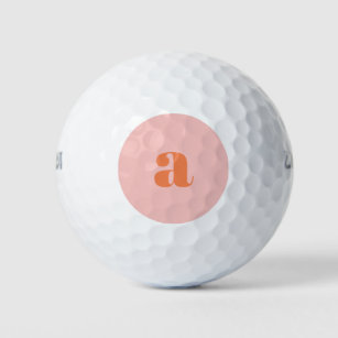 Niedliche Pastellrosa Orange Retro-Buchstaben Golfball