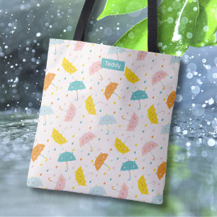 Niedliche Regenschirme und Regentropfen mit Name T
