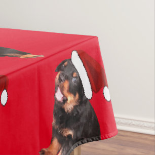 Niedliche Rottweiler-Weihnachtsmannmütze für Welpe Tischdecke