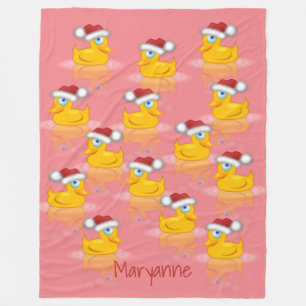 Niedliche Santa Rubber Enten im Hintergrund in hei Fleecedecke