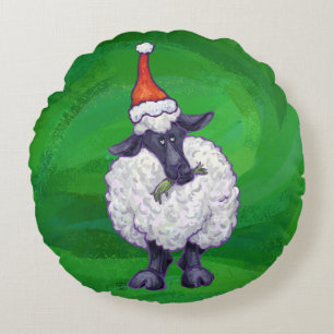 Niedliche Schafe in Weihnachtsmannmütze auf grün Rundes Kissen