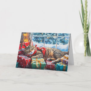 Niedliche Schlafkatze auf Weihnachtsverpackungen Feiertagskarte