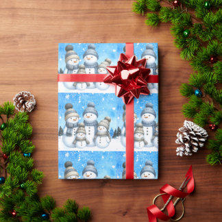 Niedliche Schneefamilie im Schnee Geschenkpapier