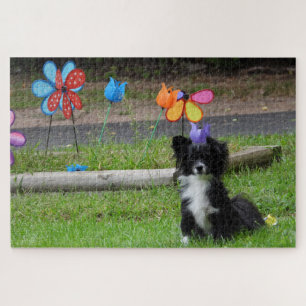 Niedliche Schwarz-Weiß-Welpe-Blume Puzzle