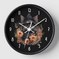 Niedliche schwarze Katze in einem Hexenhut