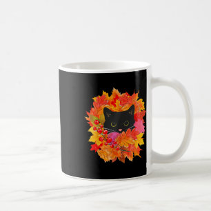 Niedliche schwarze Katzenfüllung aus Blätter Niedl Kaffeetasse