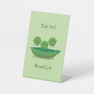 Niedliche Springererbsen in der Darstellung des Ca Sockelschild