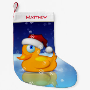 Niedliche Weihnachtsente mit Weihnachtsmannmütze  Kleiner Weihnachtsstrumpf