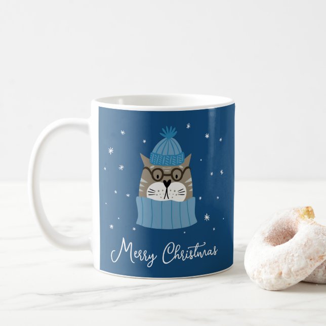 Niedliche Weihnachtskatze in gemütlichen Stricks S Kaffeetasse (Mit Donut)