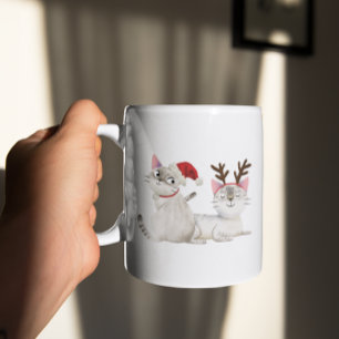 Niedliche Weihnachtskatzenwelt Weihnachtsmannmütze Kaffeetasse