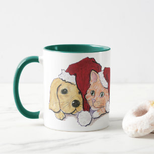Niedliche Weihnachtsleder Welpe und Orange Tabby Tasse