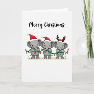 Niedliche Weihnachtslephären mit Lichtern und Weih Karte