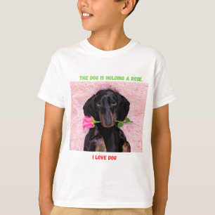Niedliche Welpe mit Rose T - Shirt für Kinder