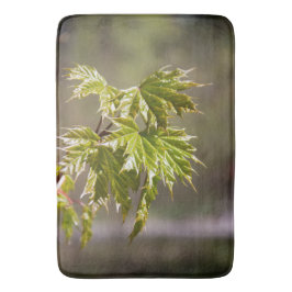 Niedlicher Ahornzweig mit kleinen Blätter Badematte