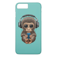 Niedlicher Baby-Affe-tragende Kopfhörer