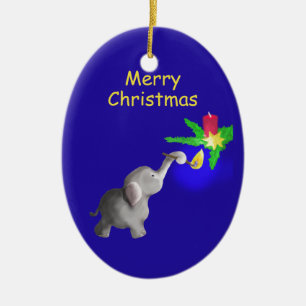 Niedlicher Baby-Elefant beleuchtet ein Keramik Ornament