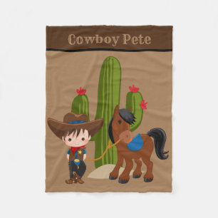 Niedlicher Baby-Junge gibt Cowboytuch Fleecedecke
