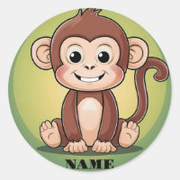 Niedlicher Babyaffe mit großem Lächelgrünen Hinter