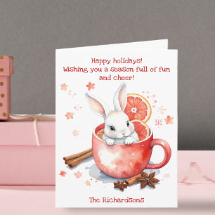 Niedlicher Bunny Peeking aus einem Roten Cup Weihn Karte