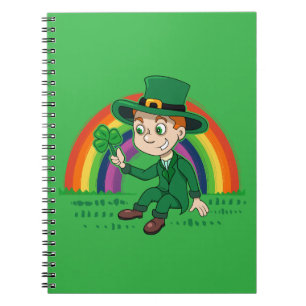 Niedlicher Cartoon-Kobold mit Kleeblatt und Regenb Notizblock