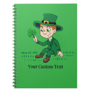 Niedlicher Cartoon-Kobold mit Kleeblatt und Regenb Notizblock