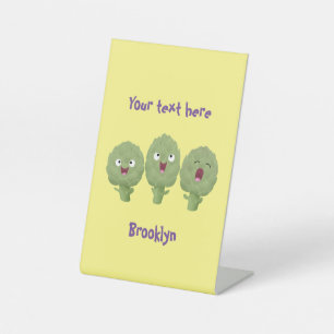 Niedlicher Cartoon mit Artischocken Sockelschild