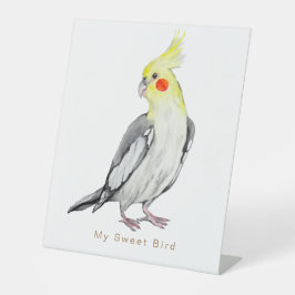 Niedlicher Cockatiel-Aquarellpapagei. Sockelschild