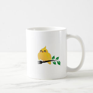 Niedlicher Cockatiel, der eine Gabel hält Kaffeetasse