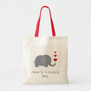 Niedlicher Elefant mit Bibliothekstasche des Tragetasche
