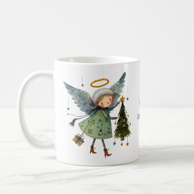 Niedlicher Engel mit Weihnachtsbaum Kaffeetasse (Links)