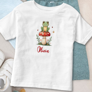 Niedlicher Frosch auf rotem Pilz Kleinkind T-shirt