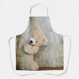 Niedlicher gepolsterter Bär Rustikale Holzwand Schürze